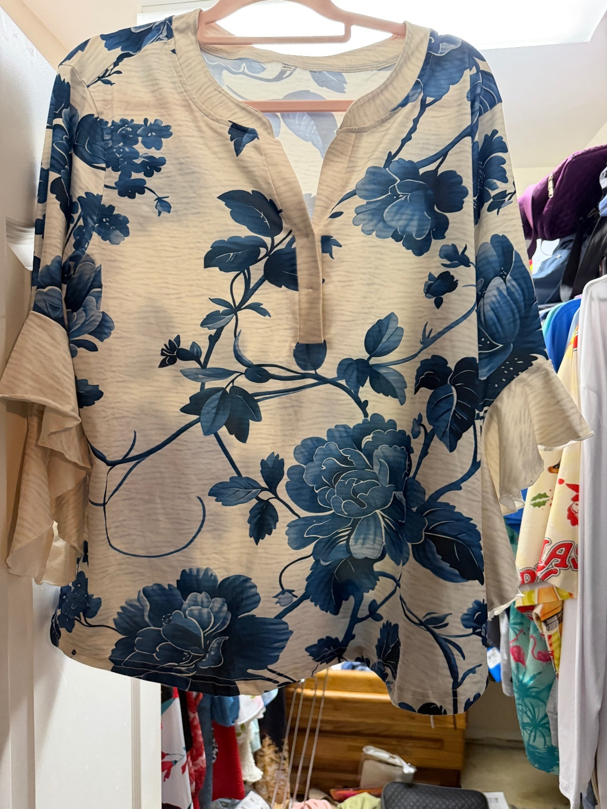 Elegant Beige and Blue Floral Blouse with Ruffle Sleeves