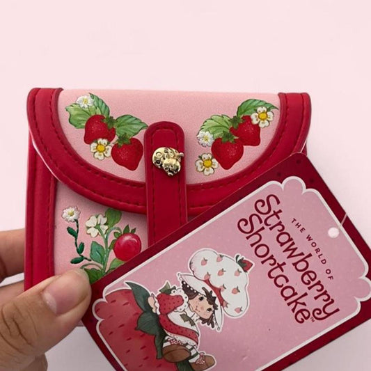 Strawberry Shortcake coin purse with tags. Loungefly Strawberry Shortcake