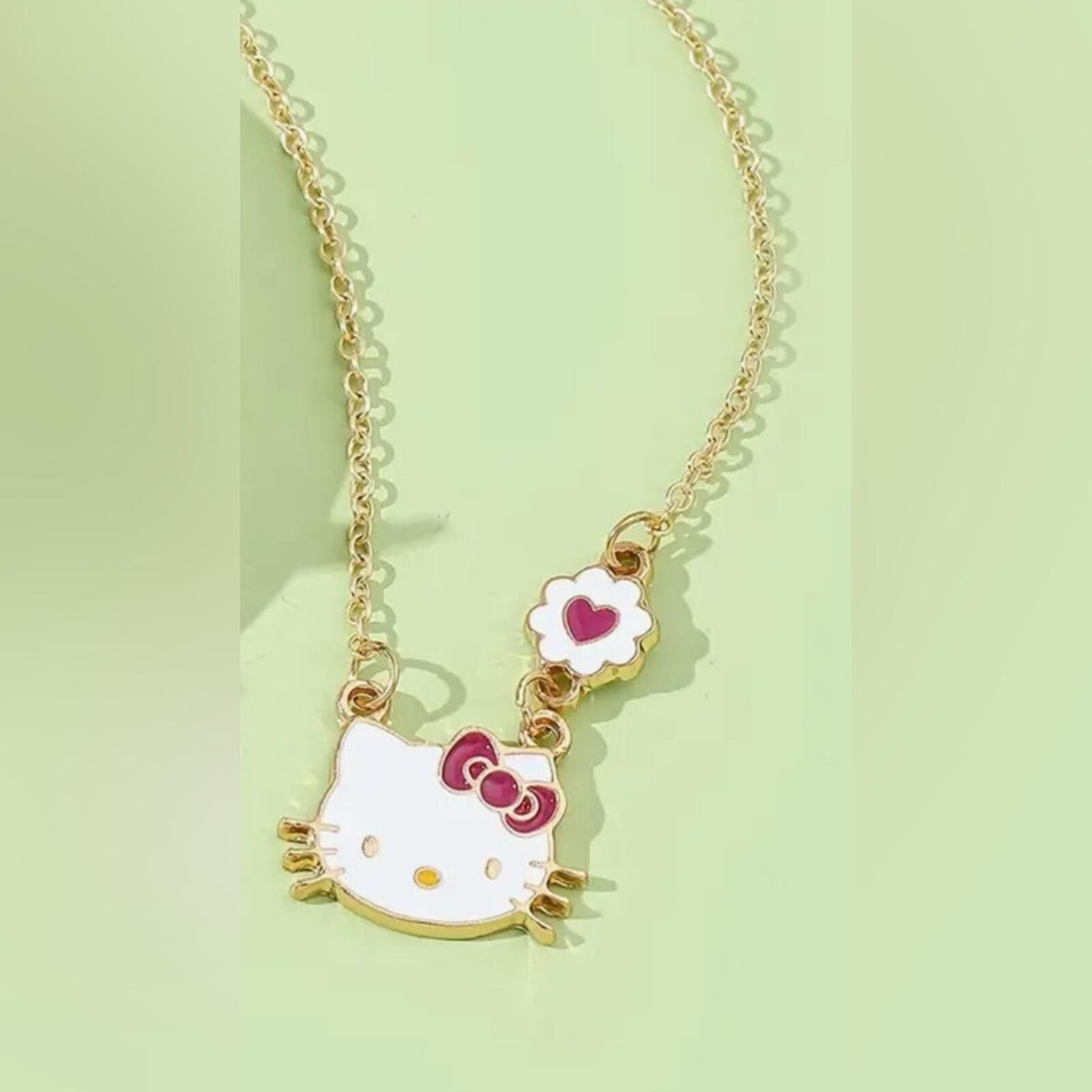 Hello Kitty Gold Tone Necklace with Pink Heart Charm - New with Tags
