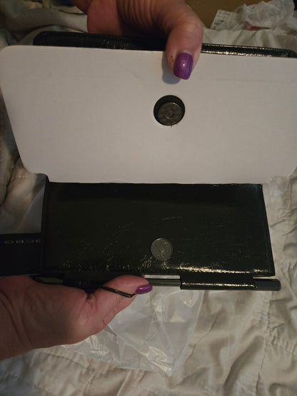 BCBG Bar Hardware Black Metallic Embossed Clutch NWT