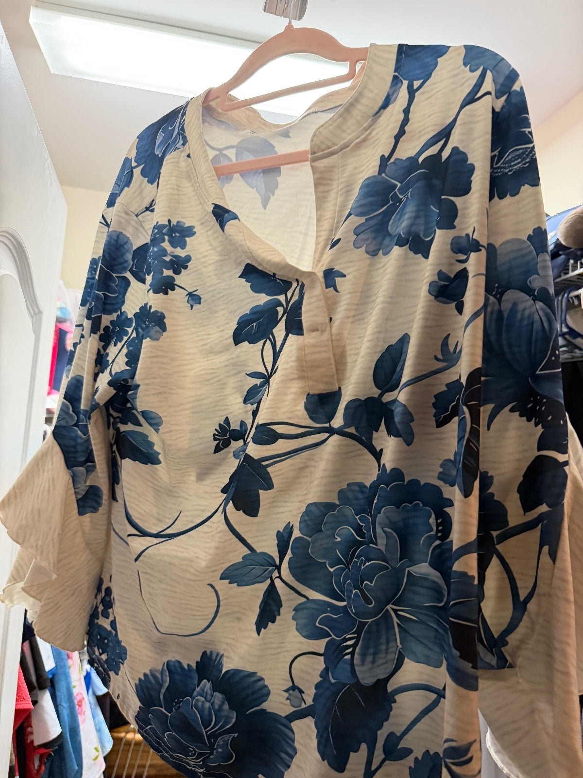 Elegant Beige and Blue Floral Blouse with Ruffle Sleeves
