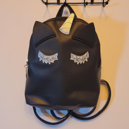 Black faux leather betsey johnson unicorn backpack with gold and silver