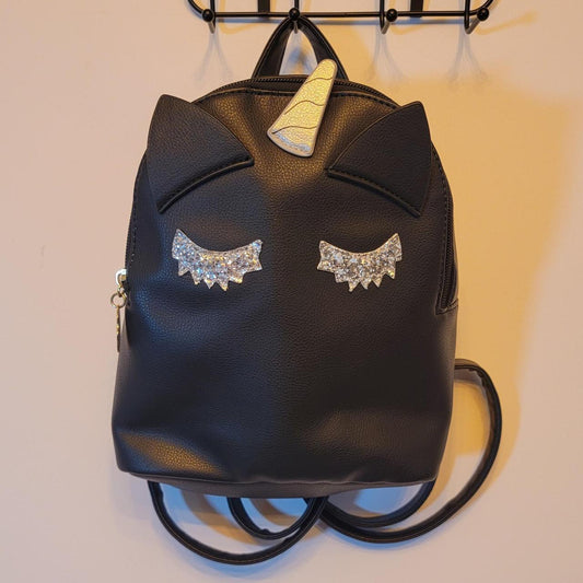 Black faux leather betsey johnson unicorn backpack with gold and silver